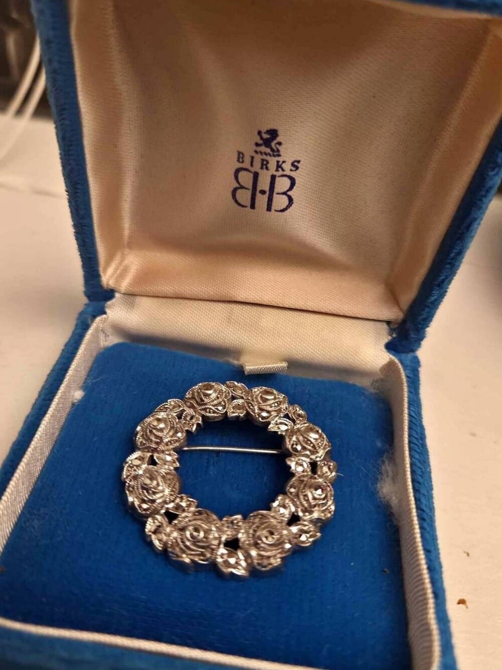 Beautiful Birks sterling silver and marcasite roses brooch. Measures 3.4cm wide.